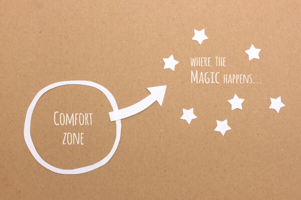 resilience is expanded by going beyond your comfort zone as indicated in the picture of a an arrow out from a circle with the words comfort zone