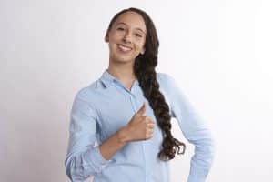 Hypnotherapists can help improve mental health - woman looking happy