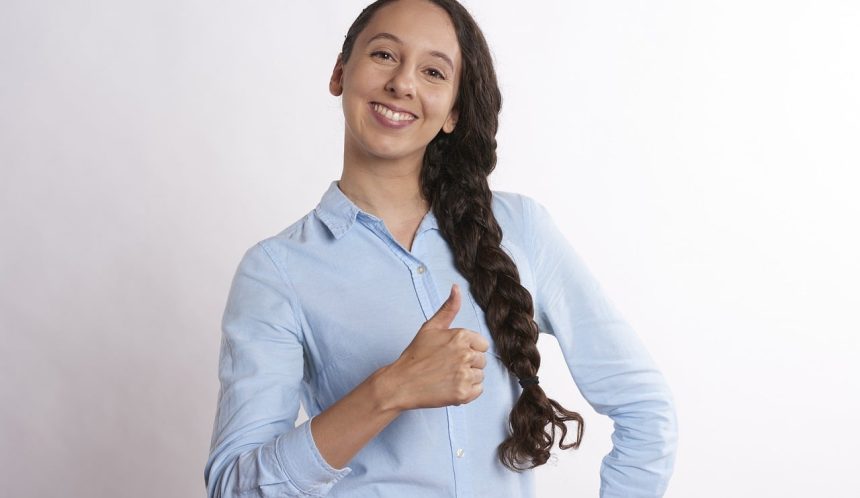 Hypnotherapists can help improve mental health - woman looking happy
