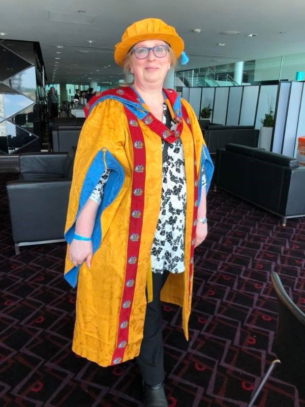 Dr Kate receiving her doctorate of education