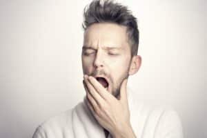 Improve mental health - man yawning
