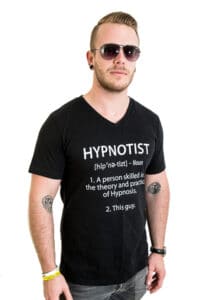 Rory Z, Hypnotic Healers podcast, shown in a hypnotist definition t-shirt.
