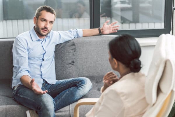 therapy therapist talking conversation man woman ladder of influence jumping to conclusions