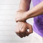 HypnoTC CPD Pain management; a picture of a man gripping his wrist